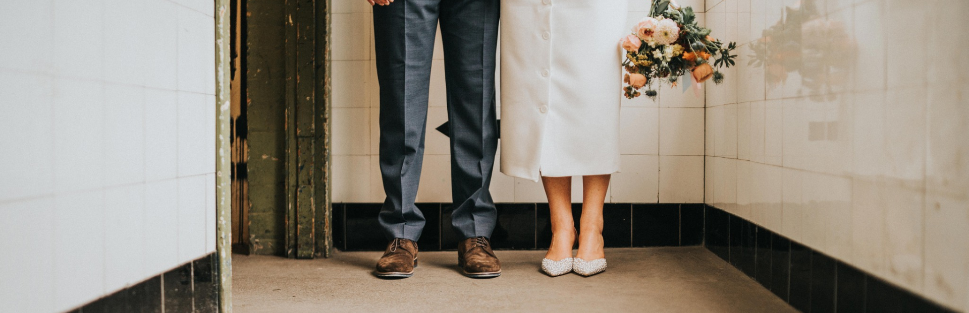 ceremony page header Photo of a couples feet
